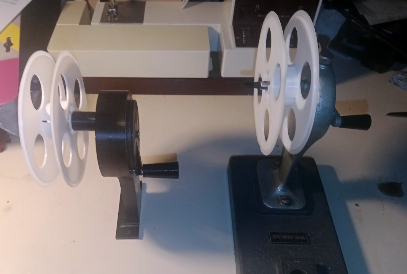 3D-printed tape winder next to original Zuse winder